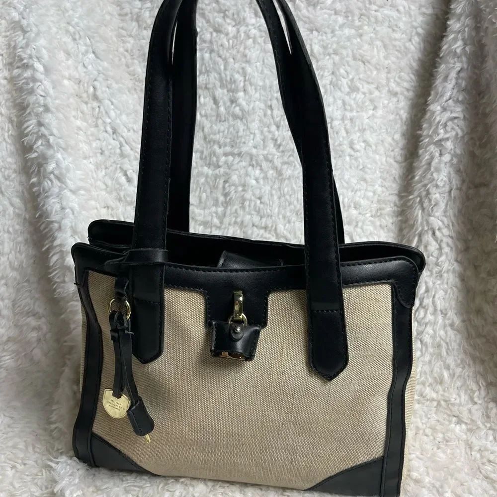London Fog Beige Canvas shoulder bag with black faux leather straps & trims